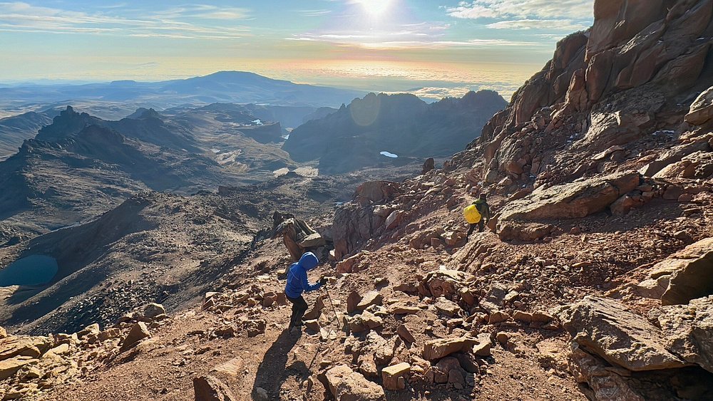 Mount Kenya hike with sunrise views and rugged terrain near Point Lenana Mount Kenya trekking guide