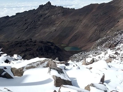 Climb Mount Kenya in 5 days Via the Chogoria-Sirimon Route — the Sirimon Route at camp.