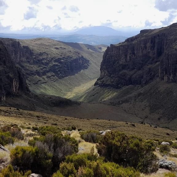 The vast green valleys and slopes of Mt Kenya’s alpine zones on the Mount Kenya Chogoria route